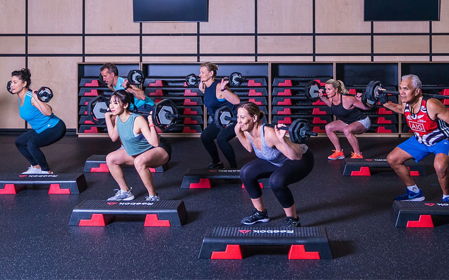 A group of men and women participating in a Fitness Pump class at Christchurch Recreation and Sport.
