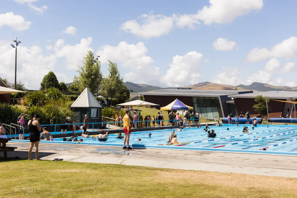 The Halswell Summer Pool with residents swimming in the lane pool.