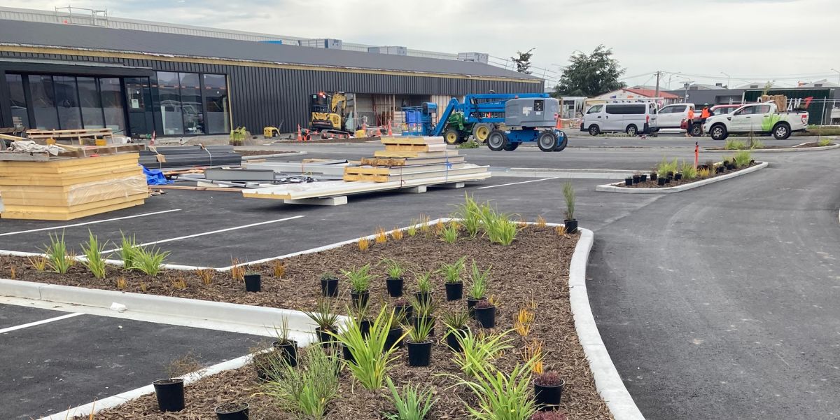 The garden beds and unfished parking lot of Matatiki Recreation and Sport centre during construction.