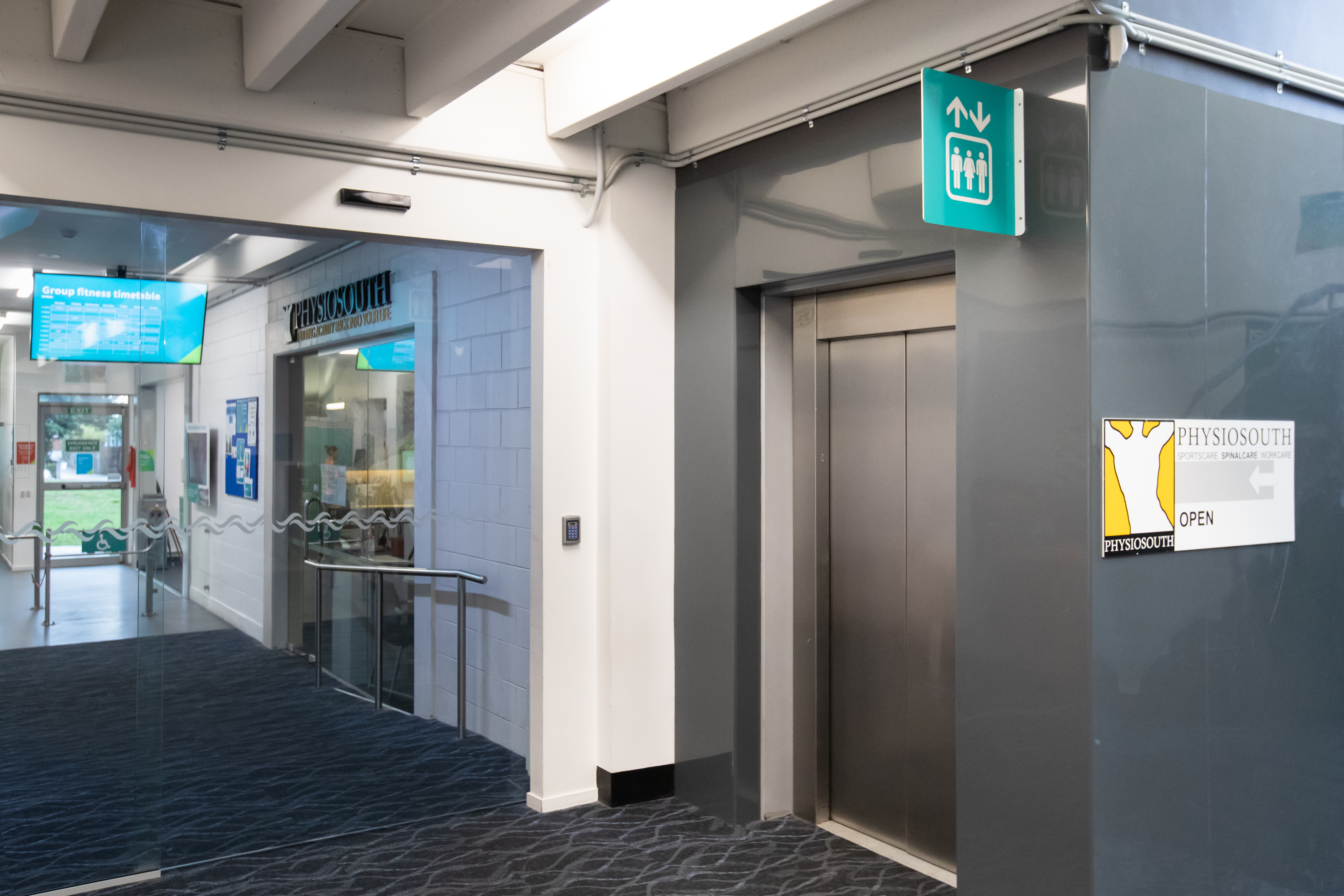 The elevators and entrance to Physiosouth inside Pioneer Recreation and Sport centre. 
